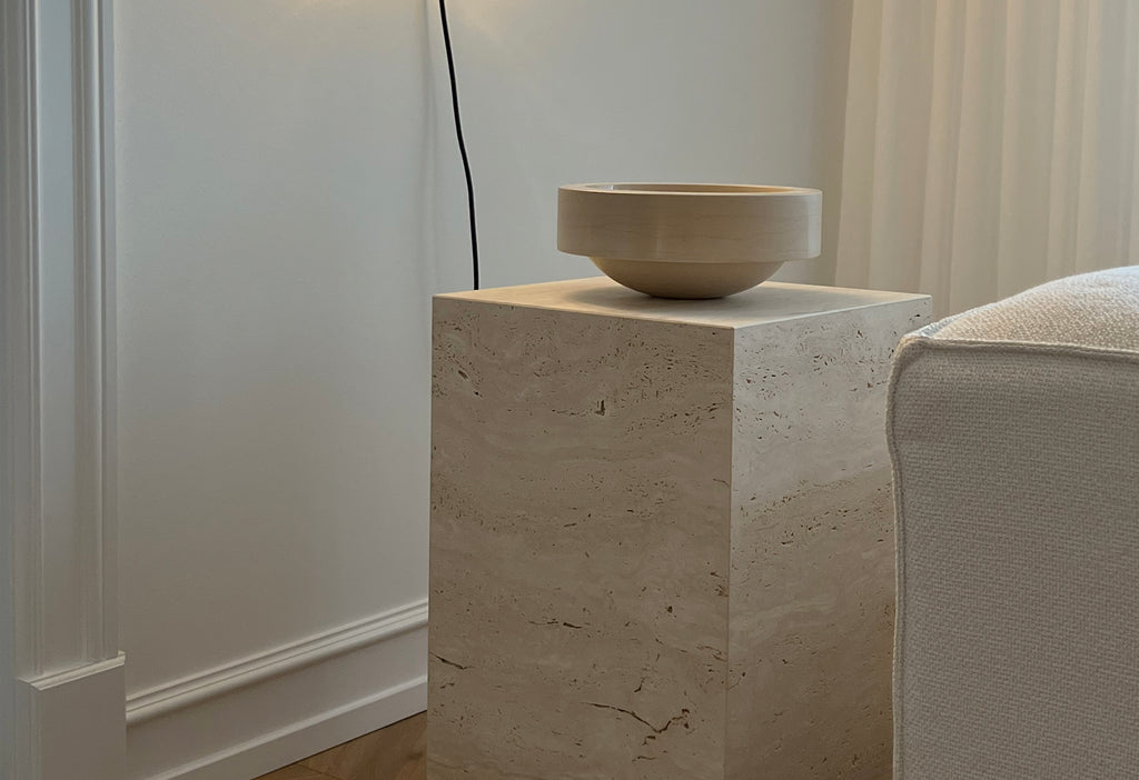 how you can integrate a travertine cube / plinth in your home decor